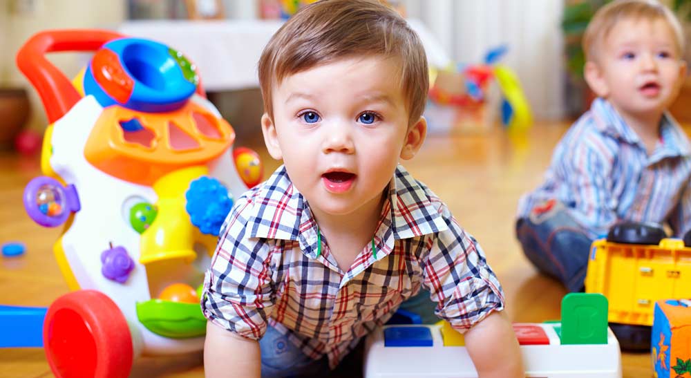 toddlers playing with toys